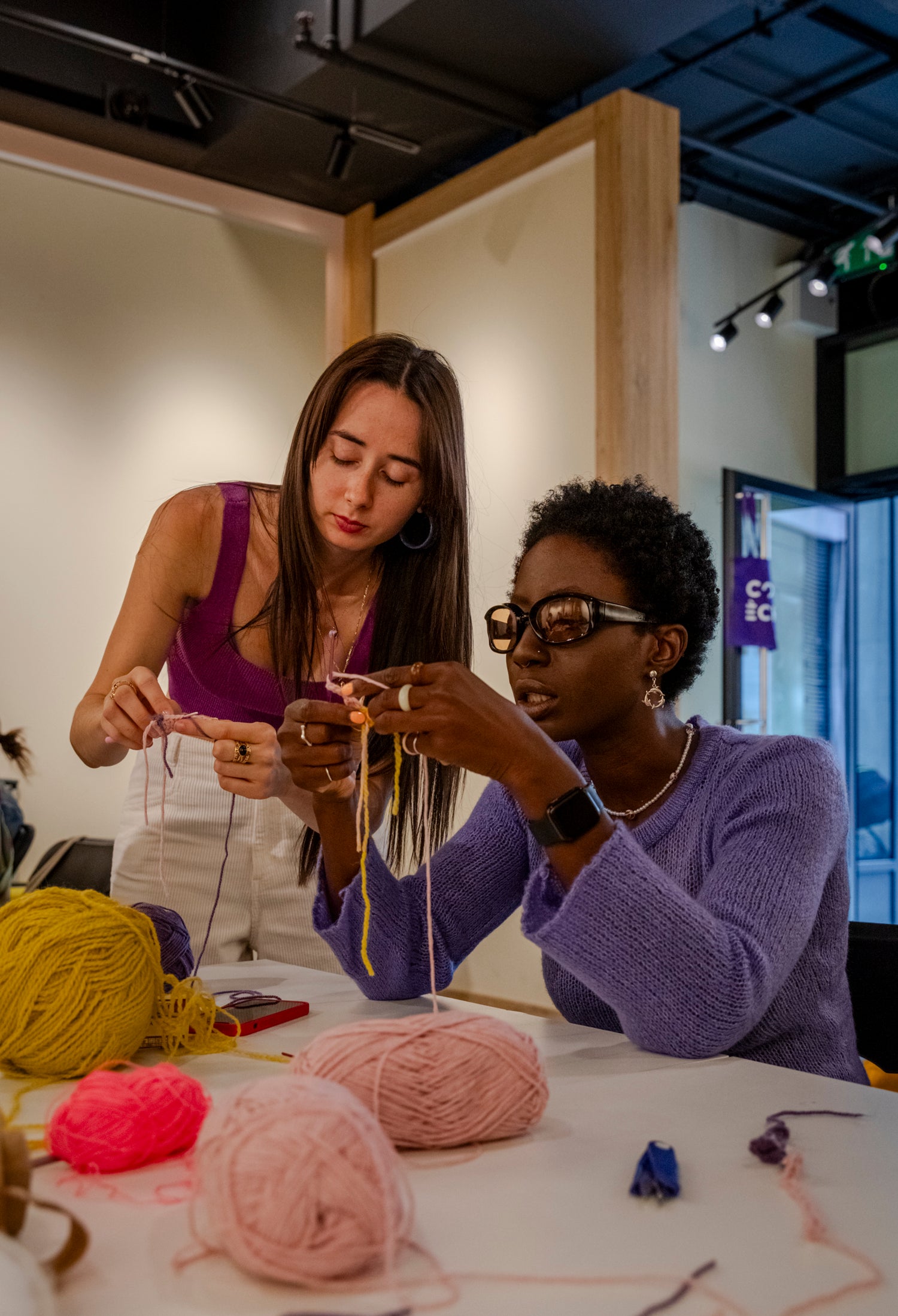 Founder Silvia Acien teaching a freeform crochet workshop with You Can Knit With Us.